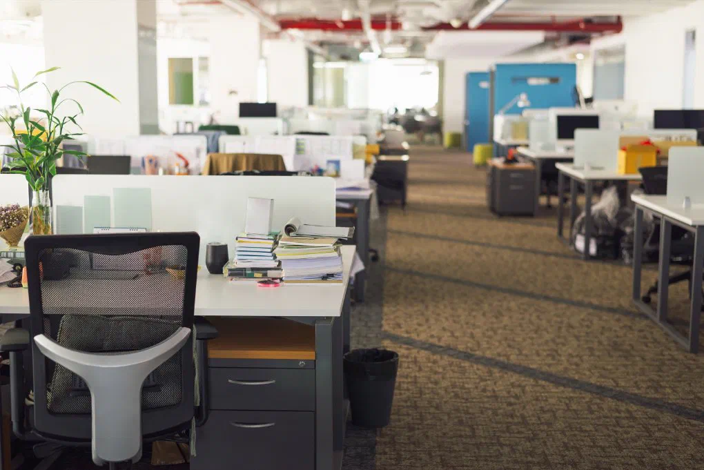 An empty office illustrating company size and childcare benefit decisions