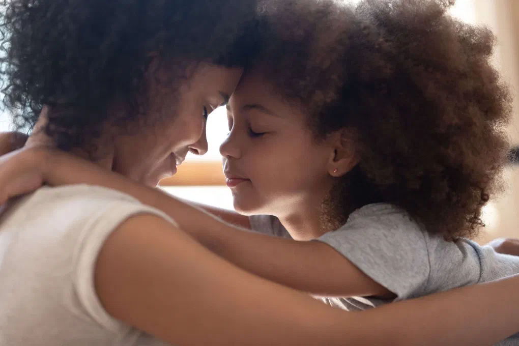 A mother and child celebrating Mother's Day together