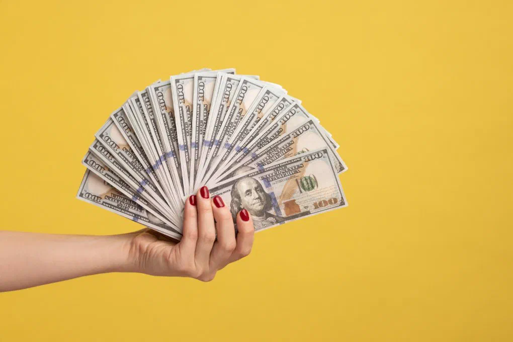 An employer calculating childcare tax credits using IRS Form 8882